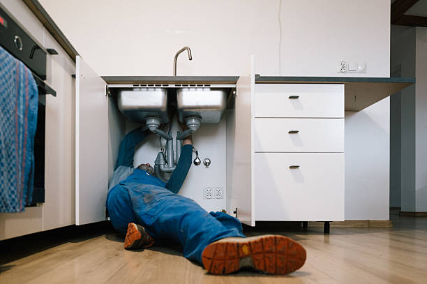 Professional Drain Cleaning technician working in Westchester, FL